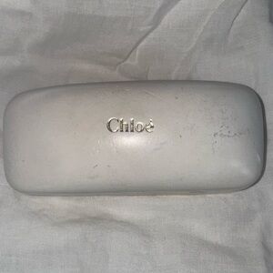 White Chloe hard sunglasses case with a gold logo Chloé Eyeglass Case
